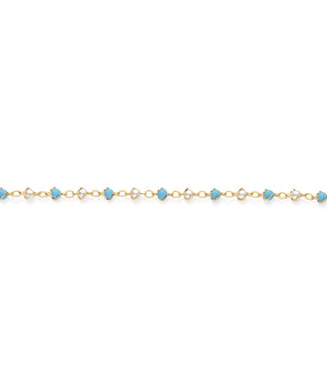 GOLD BRACELET WITH PEARL AND STONE