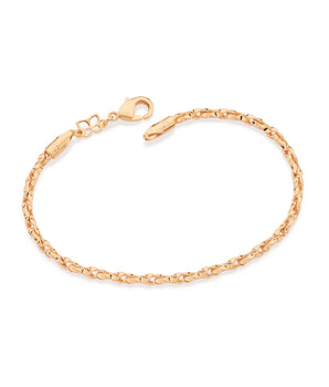 GOLD CROSSED LINK BRACELET
