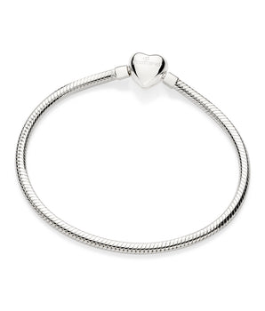 Silver-toned jewelry by Rommanel depicting a polished snake chain bracelet on a white background featuring a heart-shaped clasp and engraved butterfly logo