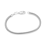 Sterling silver jewelry by Rommanel featuring a snake chain bracelet on a white background with an iconic butterfly logo tag and a polished lobster clasp showing Ag 925 engravings