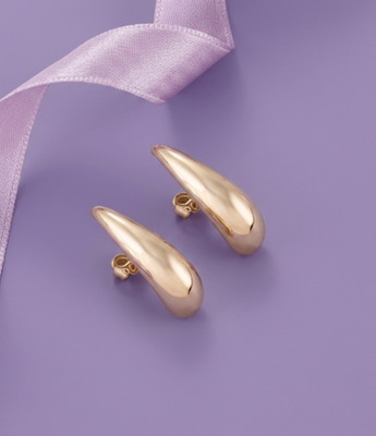 Gold curved tear-drop stud earrings displayed with a purple ribbon.