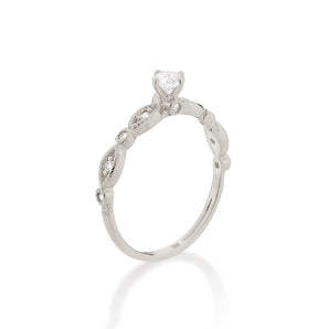 RHODIUM TWISTED POINT OF LIGHT SOLITAIRE RING