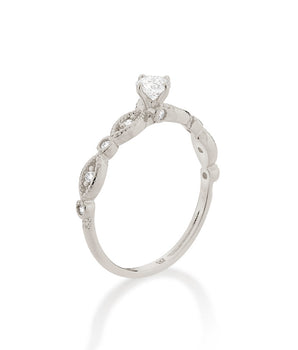 RHODIUM TWISTED POINT OF LIGHT SOLITAIRE RING
