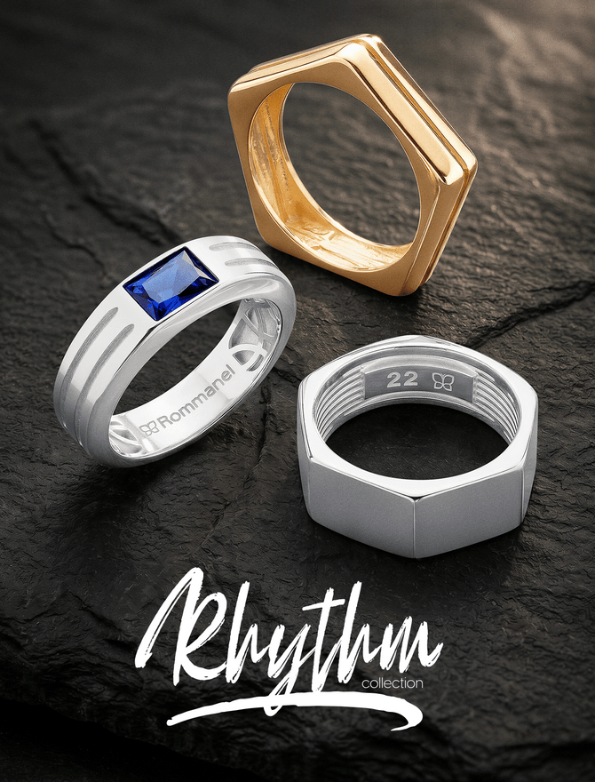 Promotional image for the 'Rhythm collection' on a dark, textured rock background. Features three unique men's rings: a polished gold hexagonal-shaped band, a sterling silver ring set with a single rectangle-cut blue sapphire and linear accents, and a sterling silver hex-nut shaped band revealing interior ridges and an engraved '22' stamp.