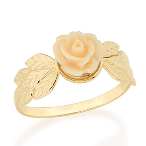 GOLD RING WITH RESIN FLOWER.