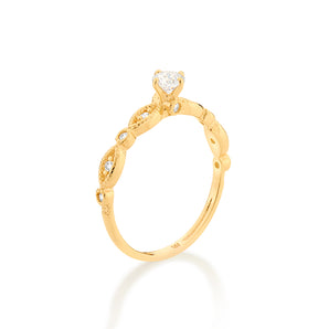 GOLD TWISTED POINT OF LIGHT SOLITAIRE RING
