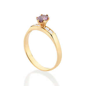GOLD HOLIDAY SURPRISE SOLITAIRE RING IN PURPLE
