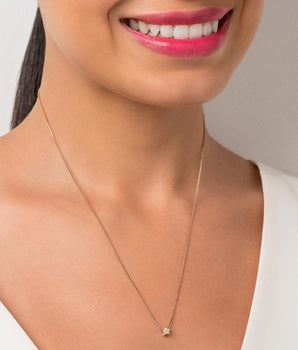 GOLD TINY STAR NECKLACE
