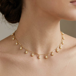GOLD PLATED SHELL NECKLACE WITH SYNTHETIC PEARLS