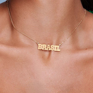 GOLD BRASIL SCRIPT NECKLACE