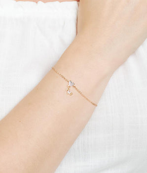GOLD HANGING BOY BRACELET