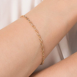 GOLD CROSSED LINK BRACELET
