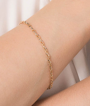 GOLD CROSSED LINK BRACELET
