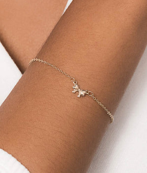 GOLD GIFT BOW BRACELET