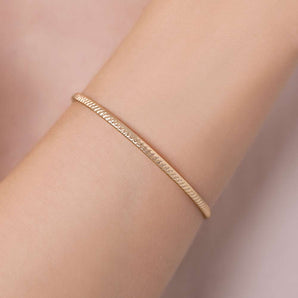 GOLD TEXTURE OF TIME CUFF BRACELET